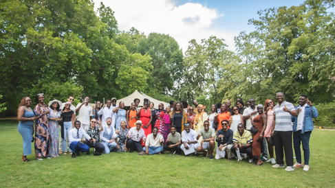 Mastercard Foundation Scholars and the programme team at the summer garden party
