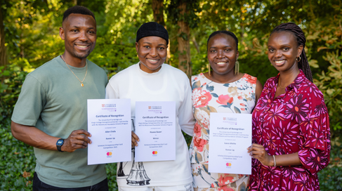 Entrepreneurship prize winners holding certificates
