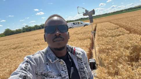 Mastercard Foundation Scholar Lagu Emmanuel Anthony at the Duxford NIAB trial grounds