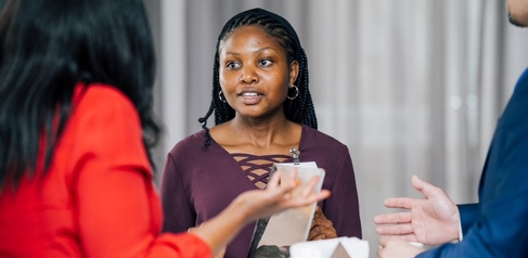 Mastercard Foundation Scholar Brenda Mumwesigye with colleagues at UN Habitat, Nairobi