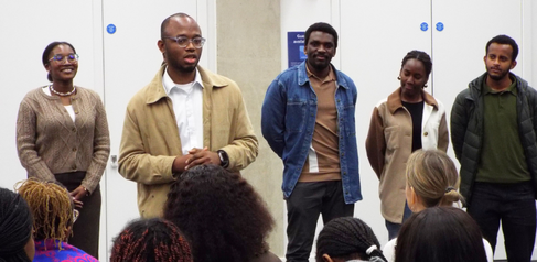 Nelson speaking at leadership training in Cambridge 