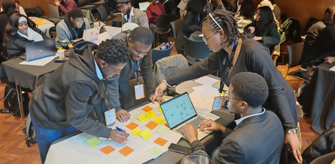 Mastercard Foundation Scholars in a group discussion at the Social Ventures Residential