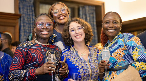 Mastercard Foundation Scholars at a formal College dinner